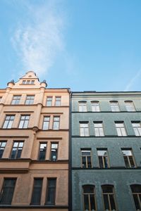 Low angle view of building against blue sky