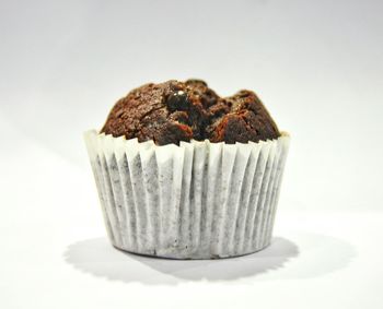 Close-up of cupcakes against white background