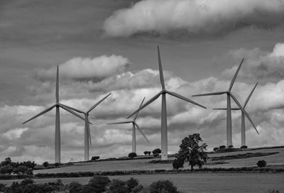 Wind turbines on countryside landscape