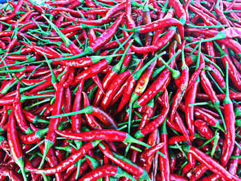 Full frame shot of red chili peppers for sale at market