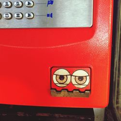 Close-up of red telephone