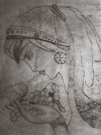 Close-up of cross on wall