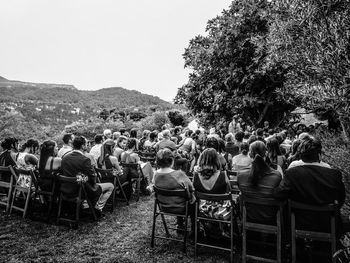 Group of people sitting on chair