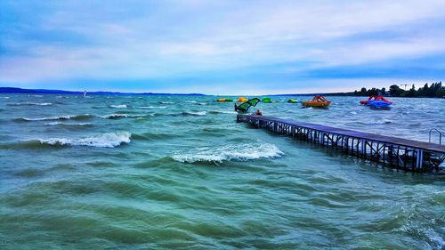 Scenic view of sea against cloudy sky