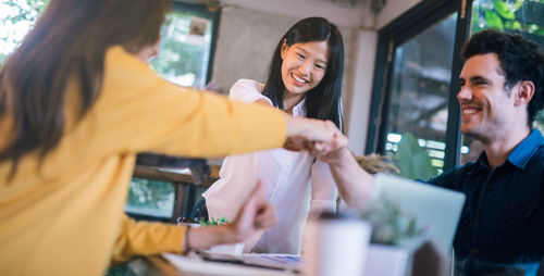 Business people working in cafe