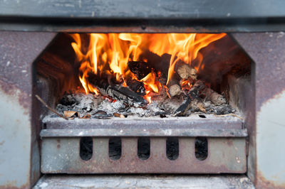 Close-up of fire on wood