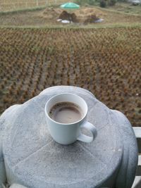 High angle view of coffee cup on table