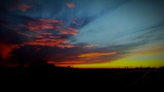 Scenic view of silhouette landscape against sky during sunset