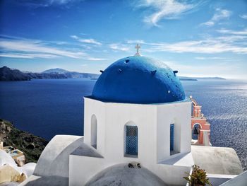 Building by sea against blue sky oia, santorini 