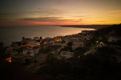 High angle view of townscape against sky during sunset