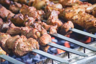 Close-up of meat on barbecue grill