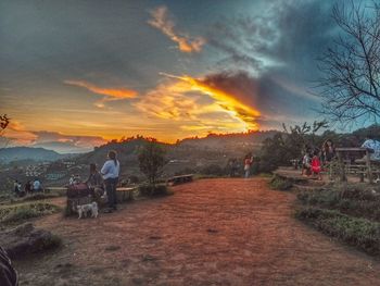 Scenic view of field against sky during sunset