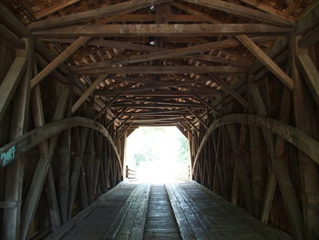 Low angle view of bridge in tunnel