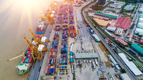 Aerial view of commercial dock by city