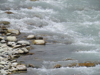Waves splashing on rocks