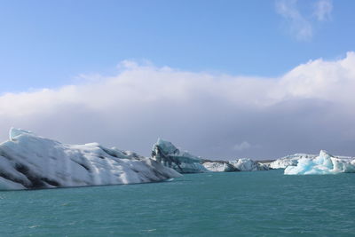 Icebergs in water