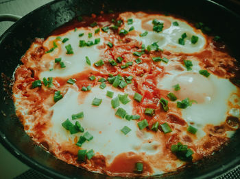 High angle view of pizza served in plate