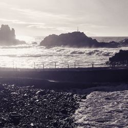 Scenic view of sea against sky during winter