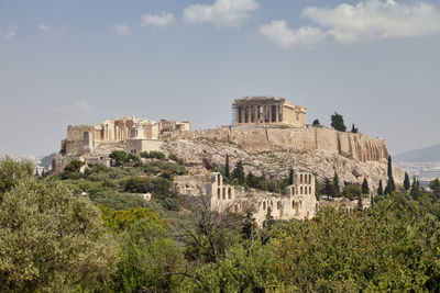 The acropolis of athens is an ancient citadel located on a rocky outcrop above the city.