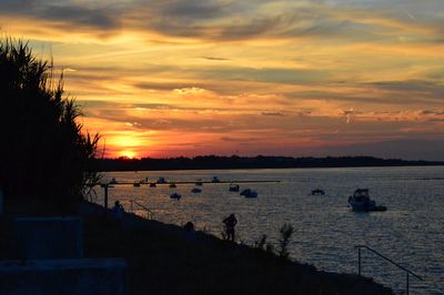 Scenic view of sea at sunset