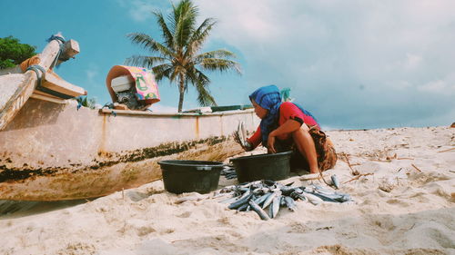 Man working on beach