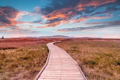 Scenic view of landscape against sky during sunset