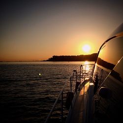 Scenic view of sea at sunset