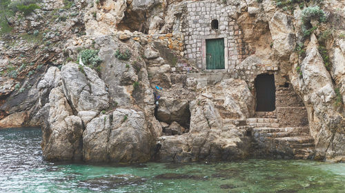 View of old building by sea