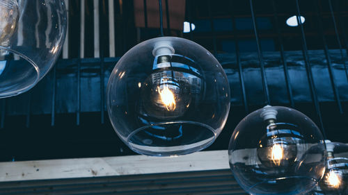 Close-up of illuminated light bulb