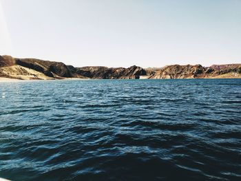 Scenic view of sea against clear sky