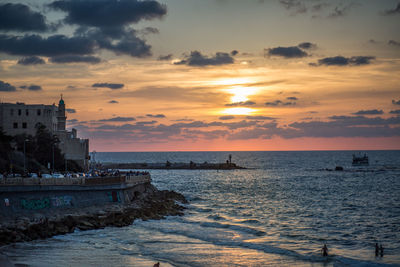 Scenic view of sea at sunset