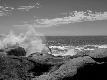 View of waves breaking on shore