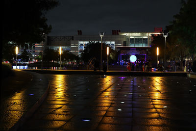 Illuminated buildings in city at night