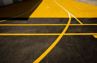 High angle view of yellow zebra crossing on road