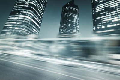 Low angle view of illuminated buildings at night