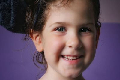 Close-up portrait of smiling boy