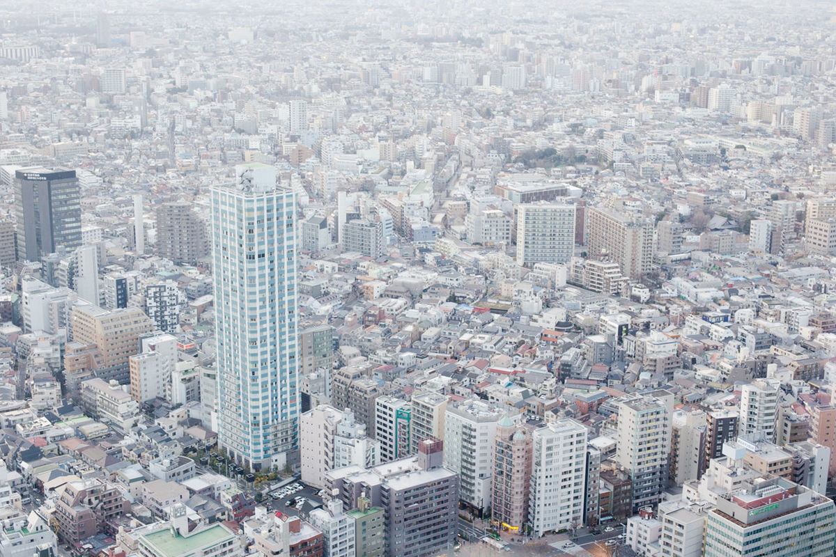 HIGH ANGLE VIEW OF MODERN CITYSCAPE