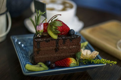 Fruits in plate on table