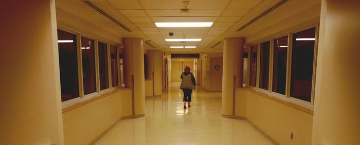 Man walking in corridor