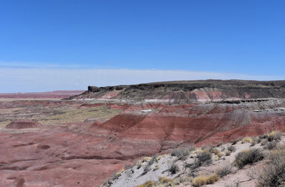 Gorgeous layered red rock canyon landscape under blue skies in arizona.