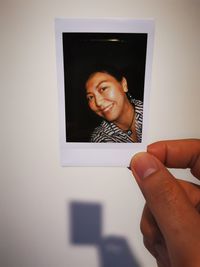 Portrait of woman photographing