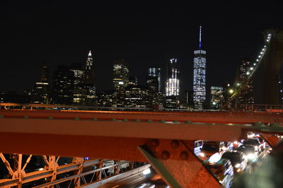 View of skyscrapers lit up at night