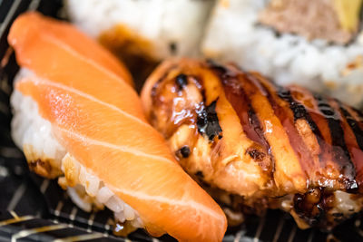 Close-up of sushi on barbecue