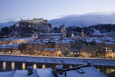 View of illuminated city during winter