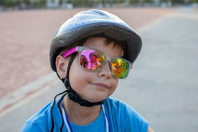 Portrait of young woman wearing sunglasses