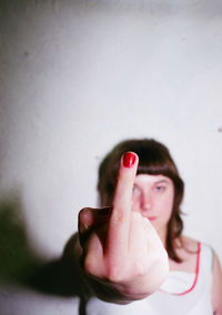 Cropped hand of woman with nail polish