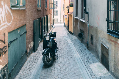 Scooter in narrow street