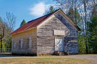 House on field against sky