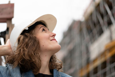 Portrait of young woman looking away