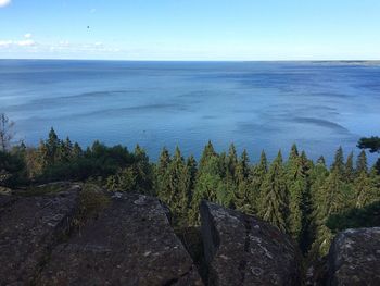 Scenic view of sea against clear blue sky